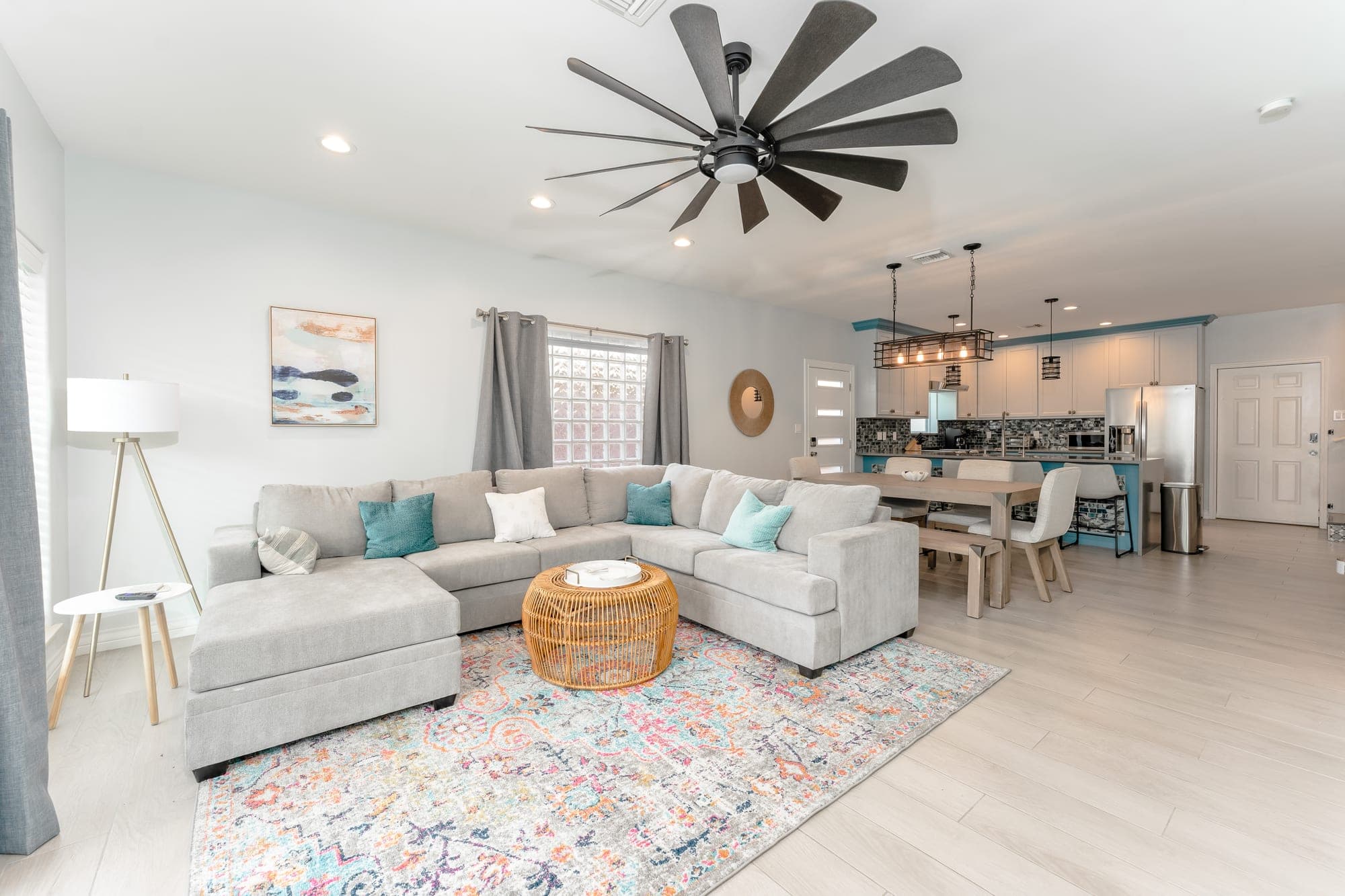 Open living room with dining and kitchen beyond