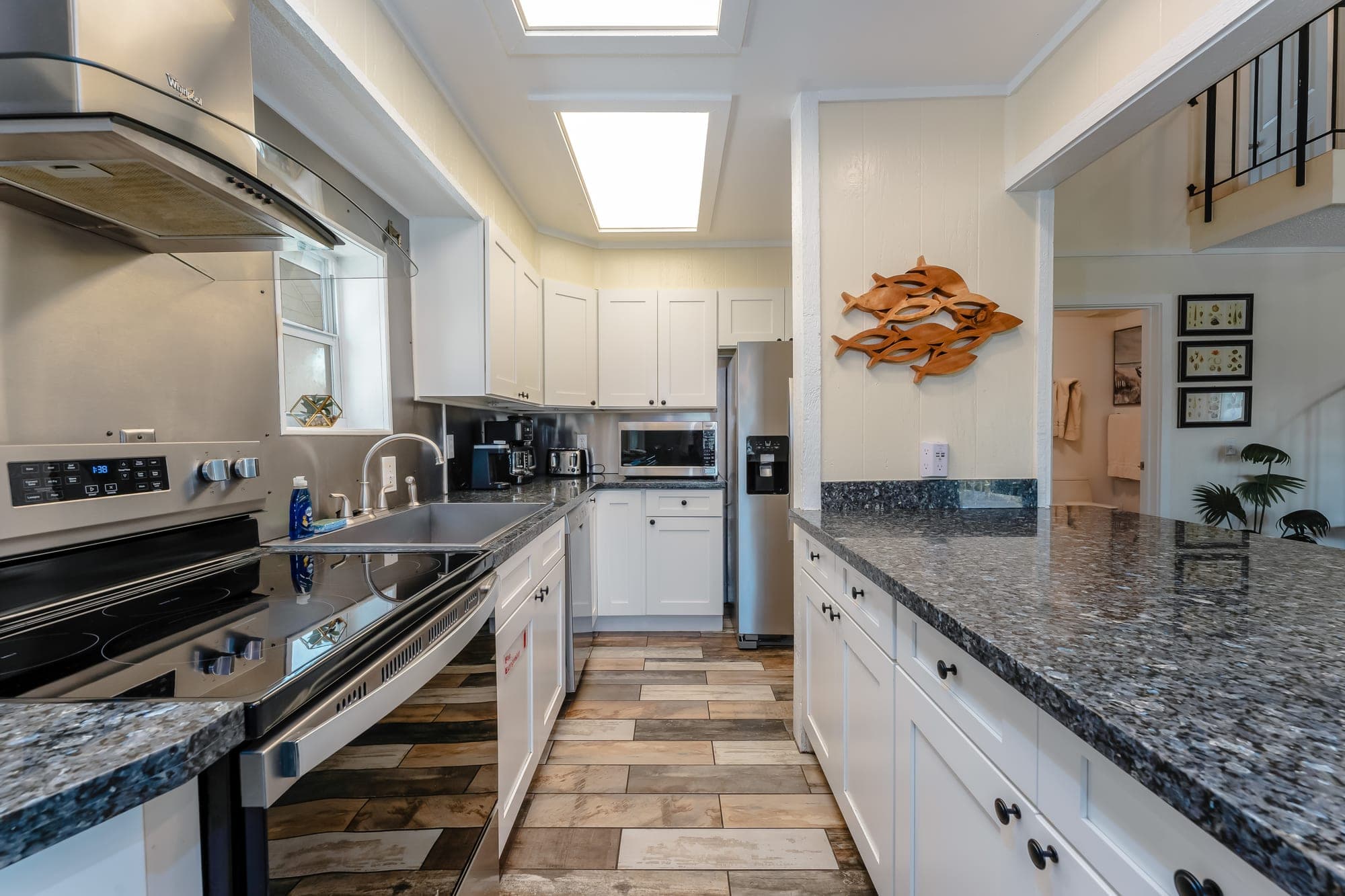 Fully stocked kitchen with granite counters